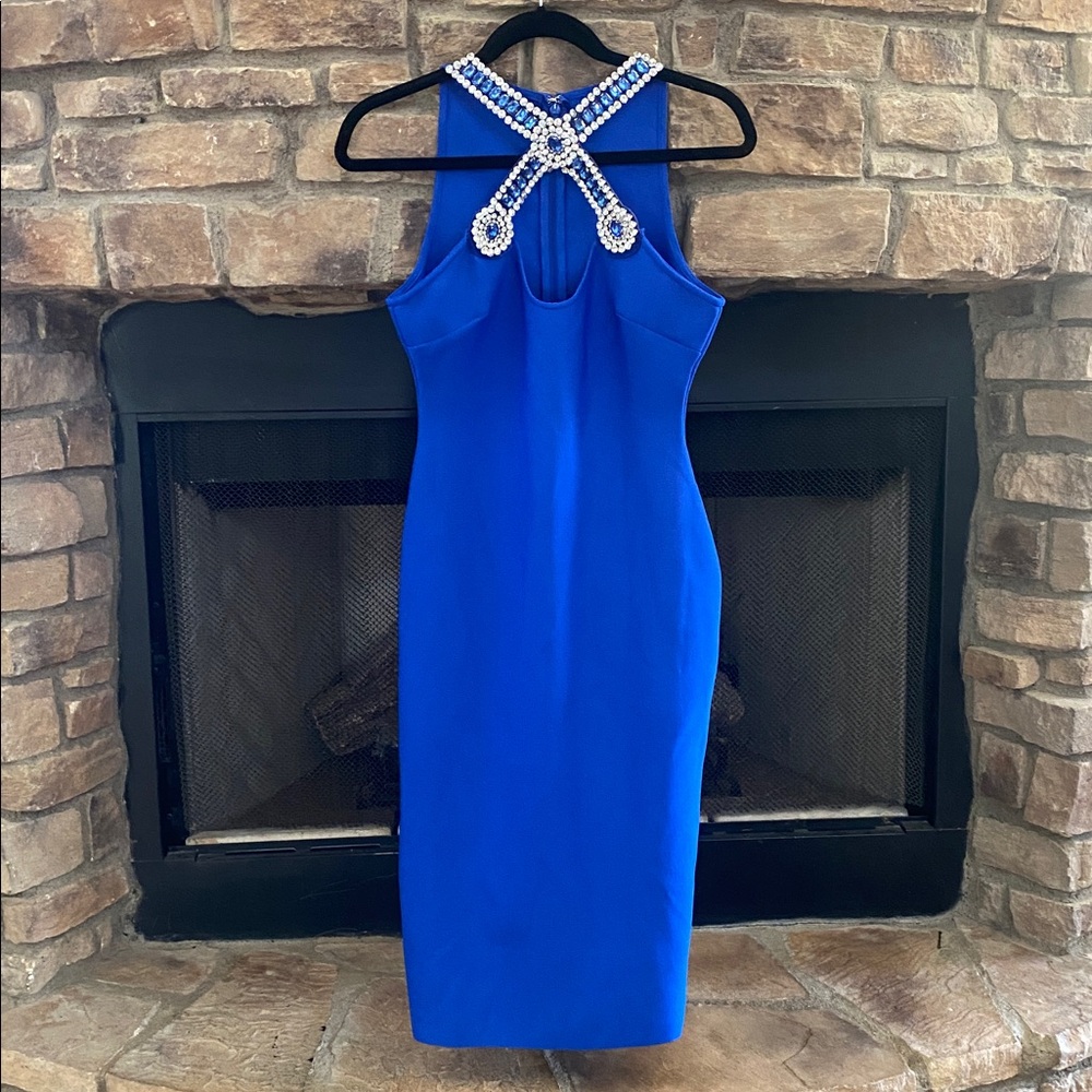 NWOT Elegant Blue Bodycon style Dress with Embellished Neckline. Medium